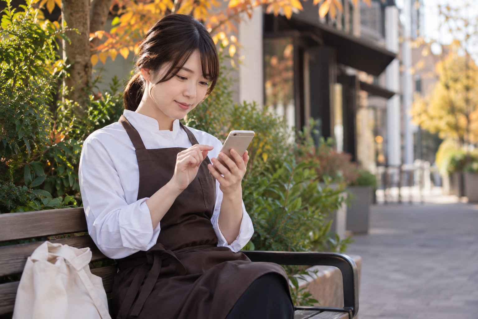 月ごとの勤務記録を確認するスタッフ。AI生成のイメージで、実際の画面・事例・提供内容を示すものではありません。